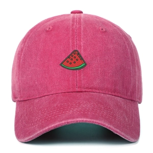 Detailed embroidery of a watermelon slice on a pink washed cotton baseball cap