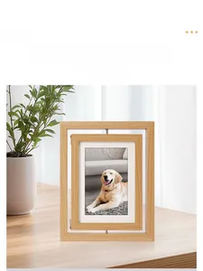 Detail of 360-degree rotating wood photo frame with plexiglass and natural wood texture