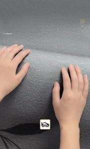 Close-up of soft gray jacquard mat featuring non-slip backing and durable fiber texture