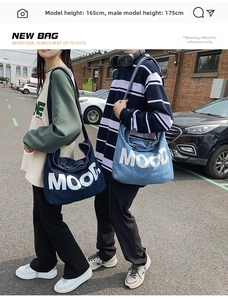 Detail shot of unisex denim tote bags with MOOD lettering worn by male and female models