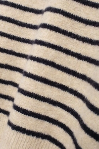 Detailed close-up showing the soft wool texture and classic striped knit pattern of the top