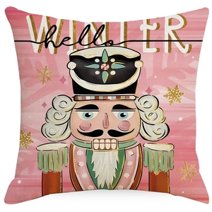 Pink linen Christmas pillowcase with Nutcracker design and Hello Winter text detail