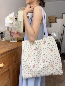 Quilted floral tote bag with purple flowers and cute pink bear pattern for daily use