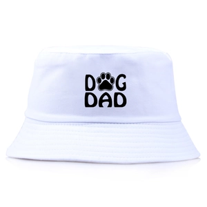 White cotton bucket hat with black DOG DAD print and paw motif shown in a front view