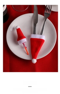 Mini Christmas hat cutlery holder and lollipop decor set on white plate