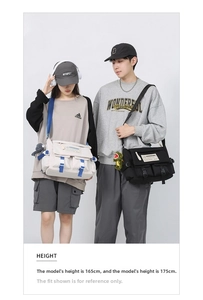 Retro canvas messenger bags in cream and black featuring a large capacity flip-top design