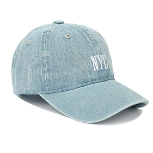 Detailed close-up of light blue washed denim baseball cap with white NYC embroidery