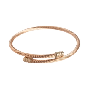 Elegant rose gold twisted cable bypass bangle with geometric textured metal end caps