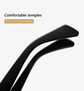 Macro view of glossy black sunglasses temples showing anti-slip texture and comfort fit