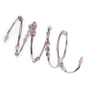 Pink zebra stone wrap bracelet with silver flower charms and layered beaded design