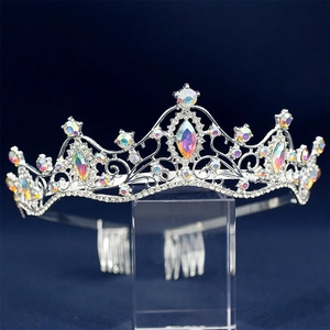 Detail of silver bridal crown with colorful AB rhinestones and side hair combs