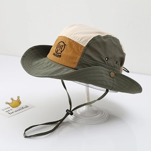 Detail of color-block kids bucket hat with chin strap and embroidery on the side