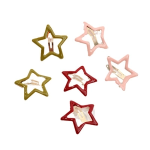 Large colorful star-shaped hair clips in olive green, red, and pink on a white background