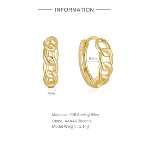 Detailed view of gold chain huggie earrings made of 925 silver and AAAAA zirconia