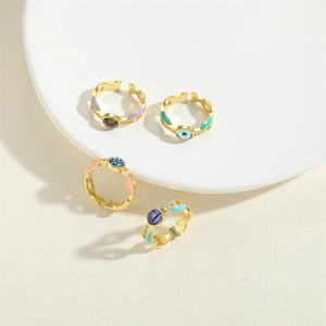 Gold adjustable evil eye rings with colorful enamel detailing for a vintage French style