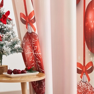 Detail of red Christmas curtain fabric with white snowflakes and festive ornaments