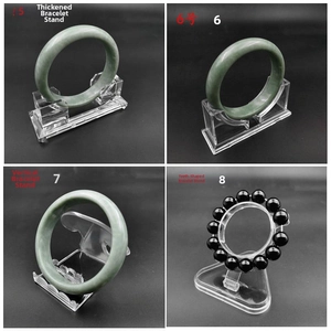 Detailed views of four transparent acrylic bracelet and bangle display stands