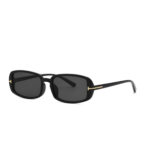 Classic black rectangular sunglasses with vintage gold T-shaped hinges and dark lenses