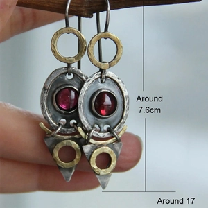 Vintage bohemian drop earrings with red stone and antique silver finish on long pendant