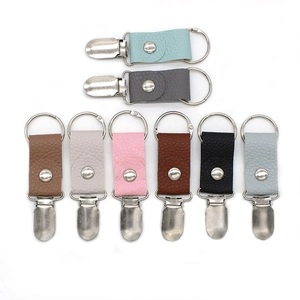 Universal PU leather hat clips for travel bags in eight assorted colors with metal rings