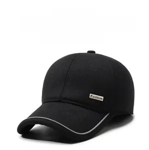 Detail view of winter baseball cap with fleece lining and reflective brim piping