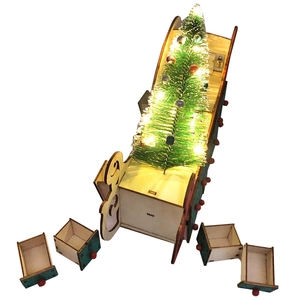 Wooden Christmas sleigh advent calendar with 24 numbered drawers and mini LED tree