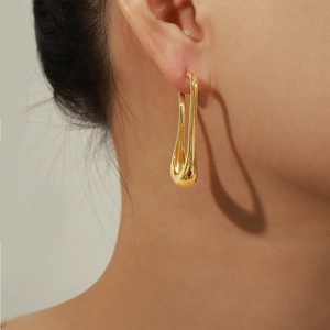 Elegant gold-tone geometric drop earrings for women with a sleek metallic finish