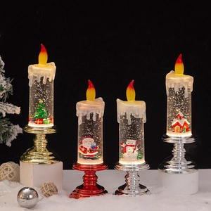Christmas LED candle snow globes with Santa and snowman on festive glitter bases