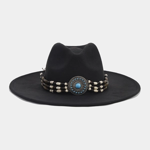 Detailed shot of a black wide brim felt hat featuring ethnic turquoise beaded bands