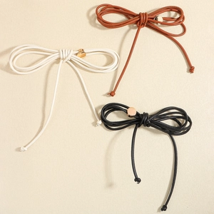 Cinture regolabili in pelle PU nera, marrone e beige con eleganti fibbie metalliche