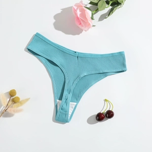 Detailed view of ribbed teal cotton thong for women on a white background with floral accents