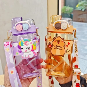 Close-up of purple unicorn and orange capybara plastic water bottles with straps