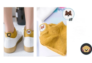 Detail showing yellow cotton ankle socks with a cute Shiba Inu embroidery patch