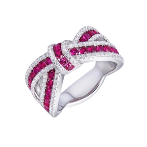 Elegant silver bow ring with red and white gemstones in a multi-layer crisscross design