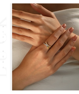 Close-up of two-tone S925 silver snake ring featuring a yellow teardrop gemstone inlay