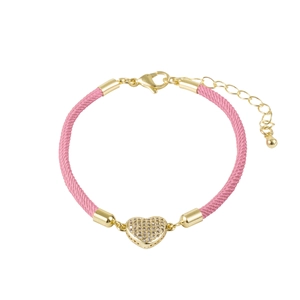 Close-up of pink braided rope bracelet with a gold heart pendant and micro-set zircons