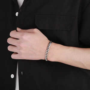 Silver Cuban link bracelet featuring a unique polished and matte dual-finish design