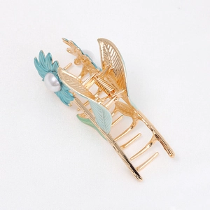 Elegant gold alloy shark clip with light blue daisy flowers and white faux pearls