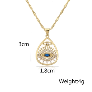 Detailed view of 18K gold plated evil eye pendant with blue zircon and size markings