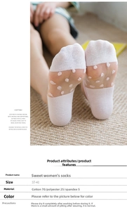 Detailed view of pink polka dot mesh socks showing 70% cotton material and size 37-41 chart
