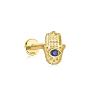 Macro detail of gold S925 Hamsa Hand stud earring with blue gemstone and S925 engraving