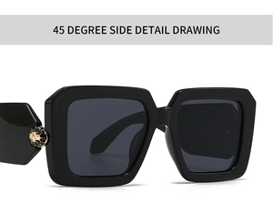 Macro side view of black square sunglasses featuring a golden serpent metal hinge detail