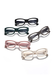 Detailed top view of cat eye optical frames in black, green, brown, pink, and cream white