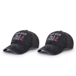 Close-up of embroidered Boat Hair Don't Care text and anchor logo on charcoal baseball cap