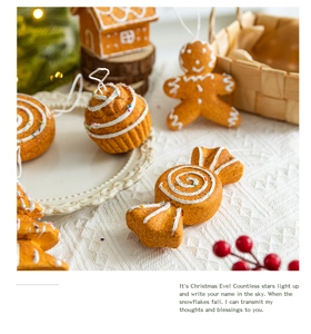 Close-up of assorted gingerbread man and candy ornaments for festive tree decoration