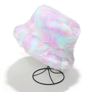 Detail of colorful faux fur texture and pastel gradient tones on warm winter bucket hat