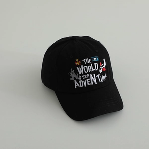 Close-up of kids black cotton baseball cap with white adventure embroidery and icons