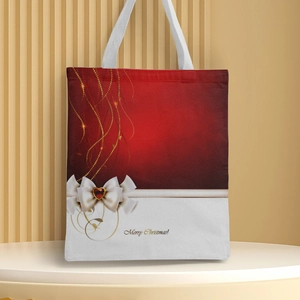 Detail of Christmas canvas tote bag featuring a gold heart and Merry Christmas print