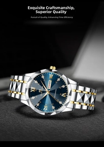 Detail of blue sunburst dial mens watch with gold markers and day-date display