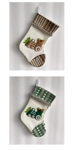 Detail of Christmas stockings with locomotive patterns and faux fur trim on white background